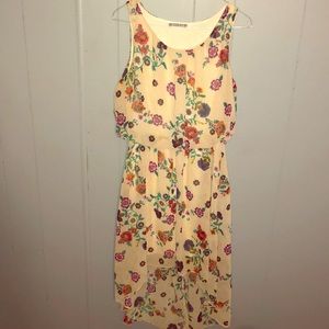 Beautiful flowing summer floral dress in tan